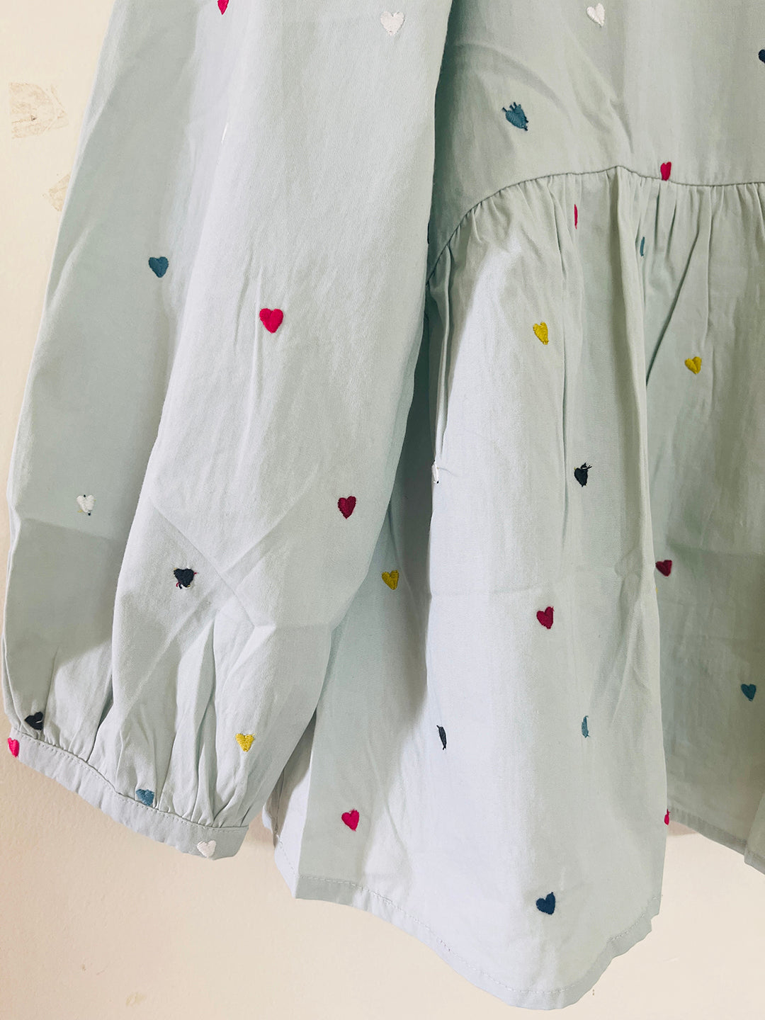 LITTLE HEARTS EMBROIDERED PEPLUM TOP