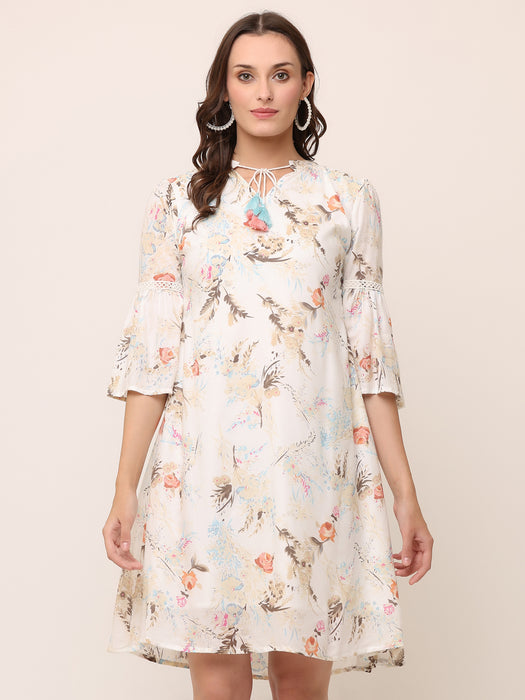 Off white Floral Textured Rayon Dress with colorful tassels