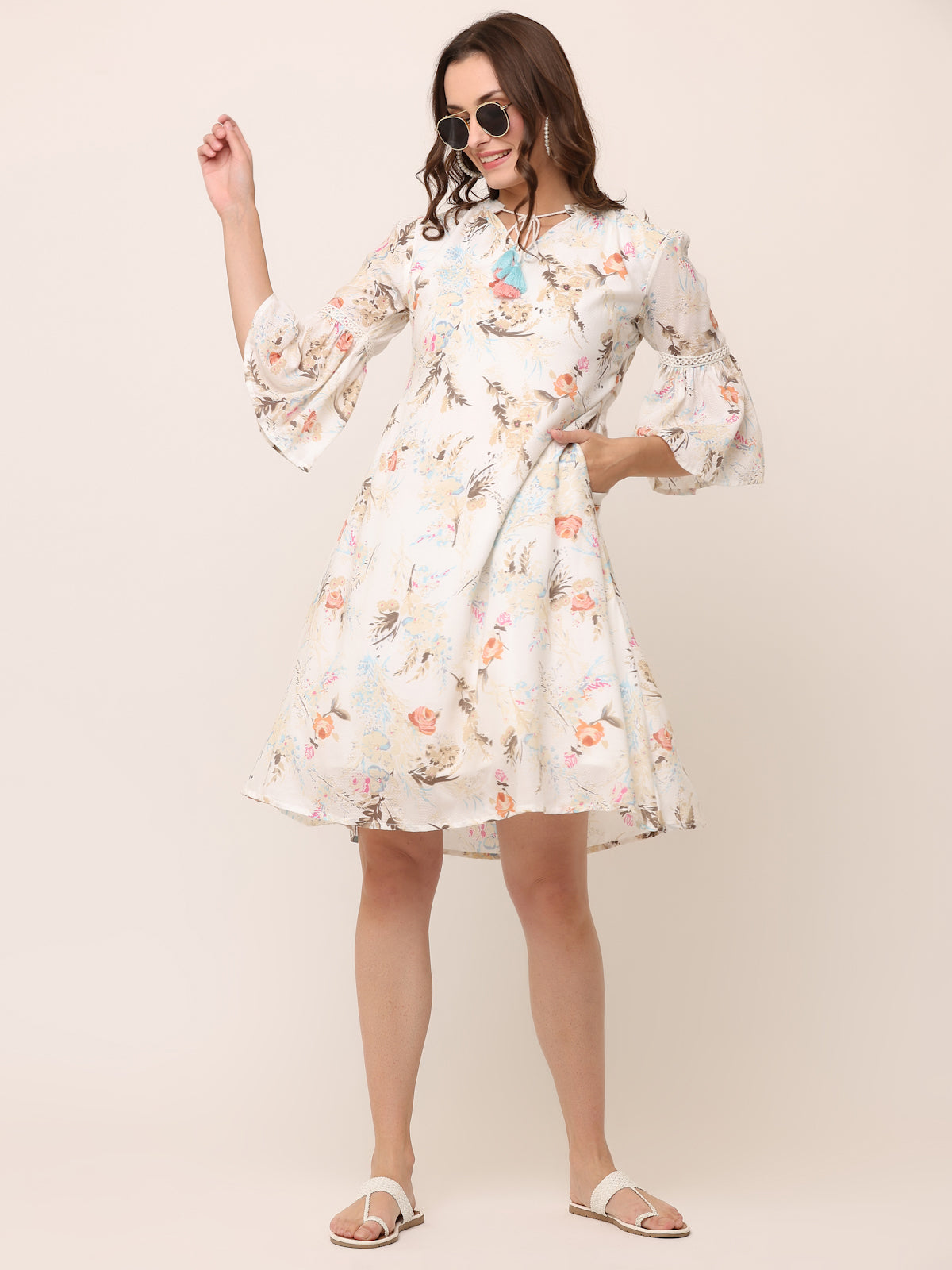 Off white Floral Textured Rayon Dress with colorful tassels