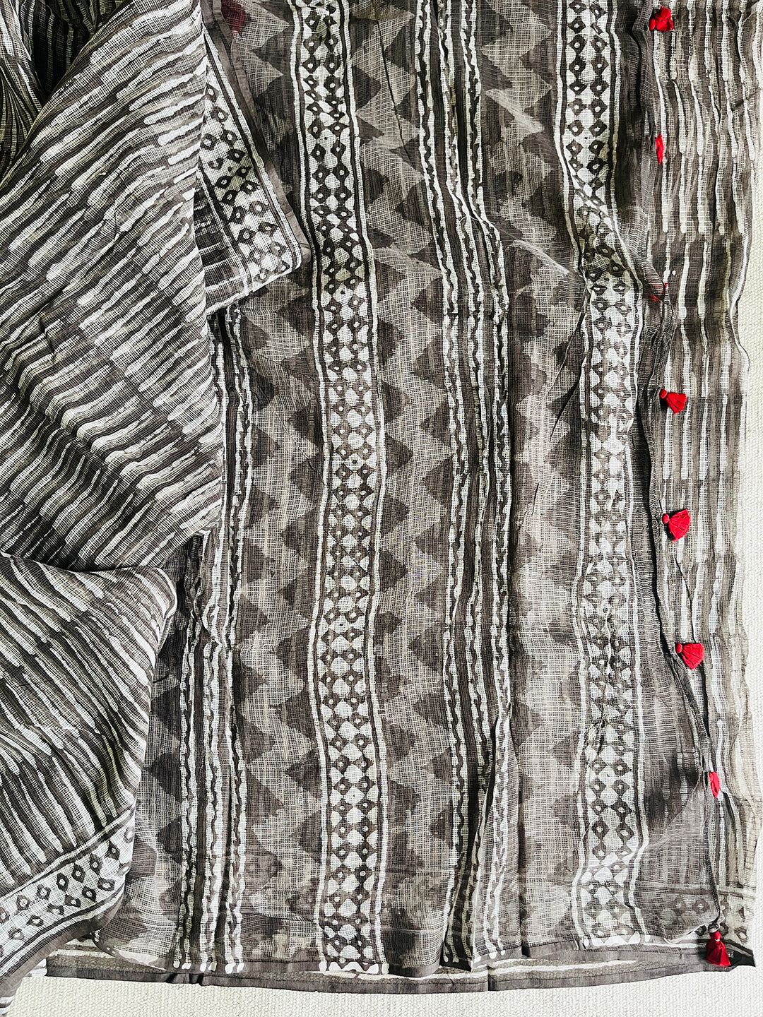 "CHASE THE WAVES" CHARCOAL KOTA DORIA SAREE  (RED TASSELS)