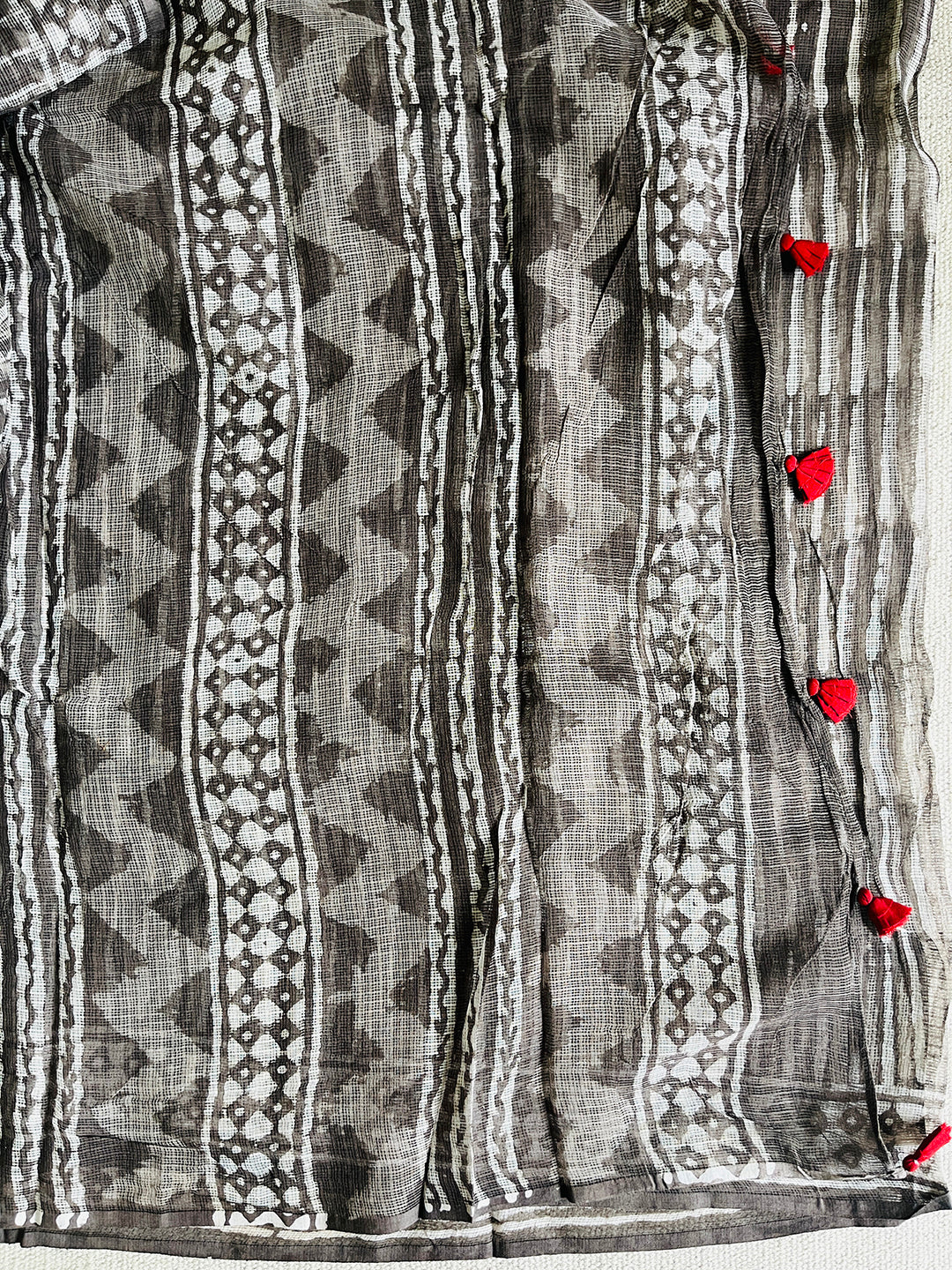 "CHASE THE WAVES" CHARCOAL KOTA DORIA SAREE  (RED TASSELS)