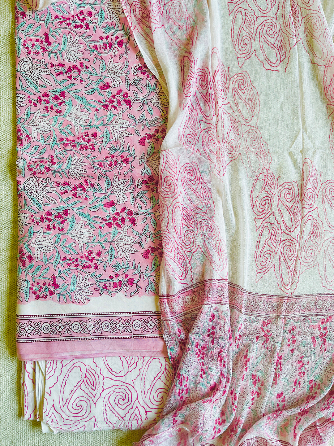 UNSTITCHED PINK ALLOVER PRINT COTTON SUIT