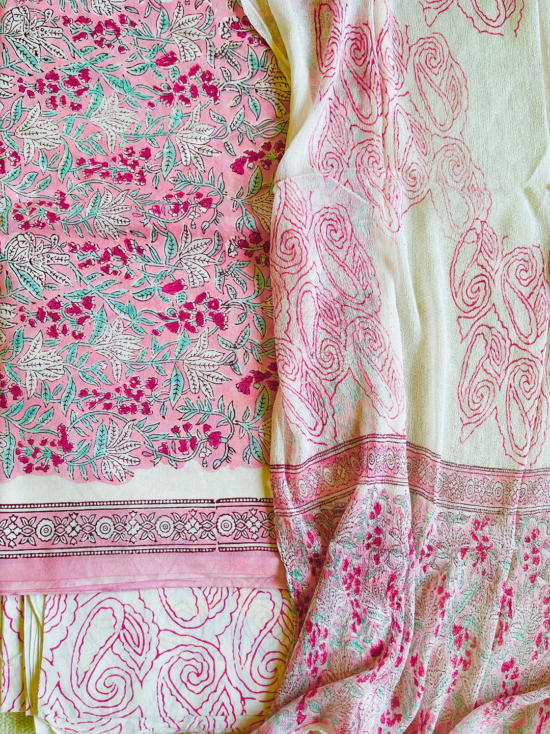 UNSTITCHED PINK ALLOVER PRINT COTTON SUIT