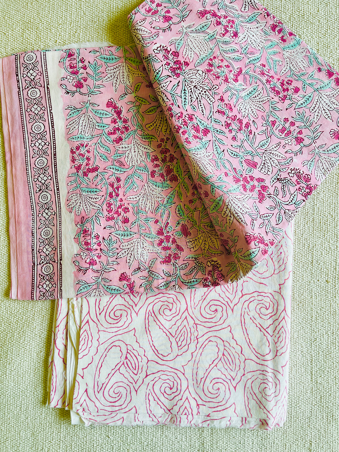 UNSTITCHED PINK ALLOVER PRINT COTTON SUIT