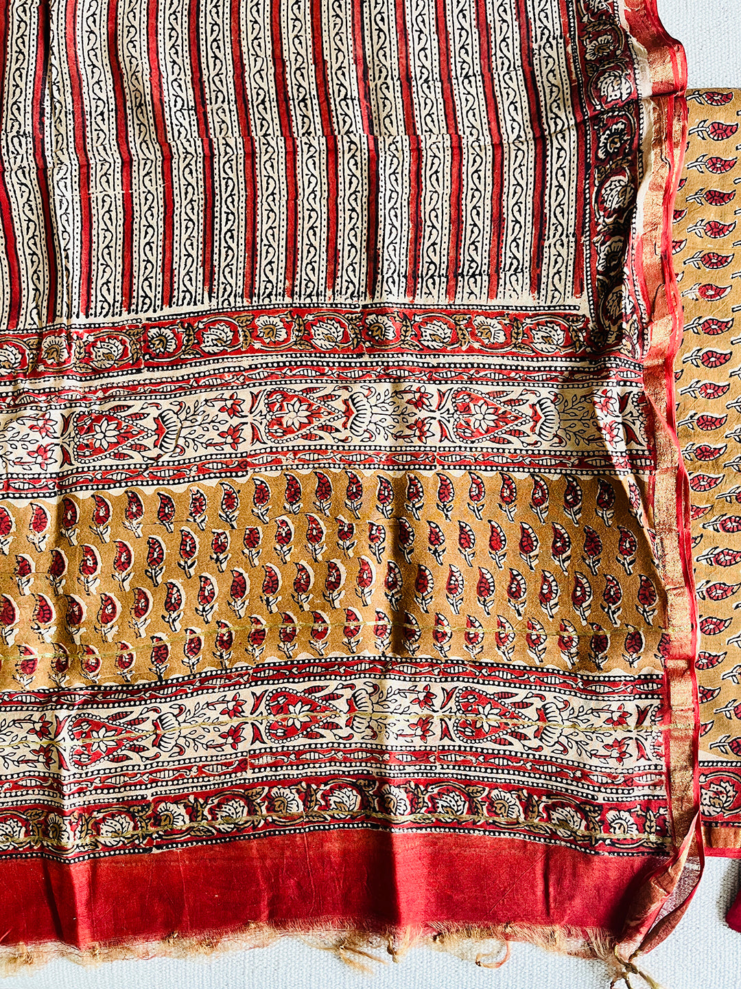 EARTHY & RED ALLOVER BOOTIES CHANDERI UNSTITCHED SUIT