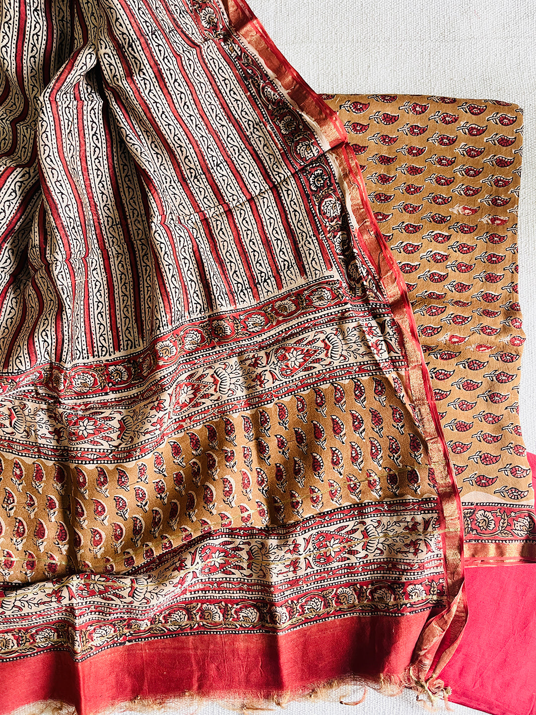 EARTHY & RED ALLOVER BOOTIES CHANDERI UNSTITCHED SUIT