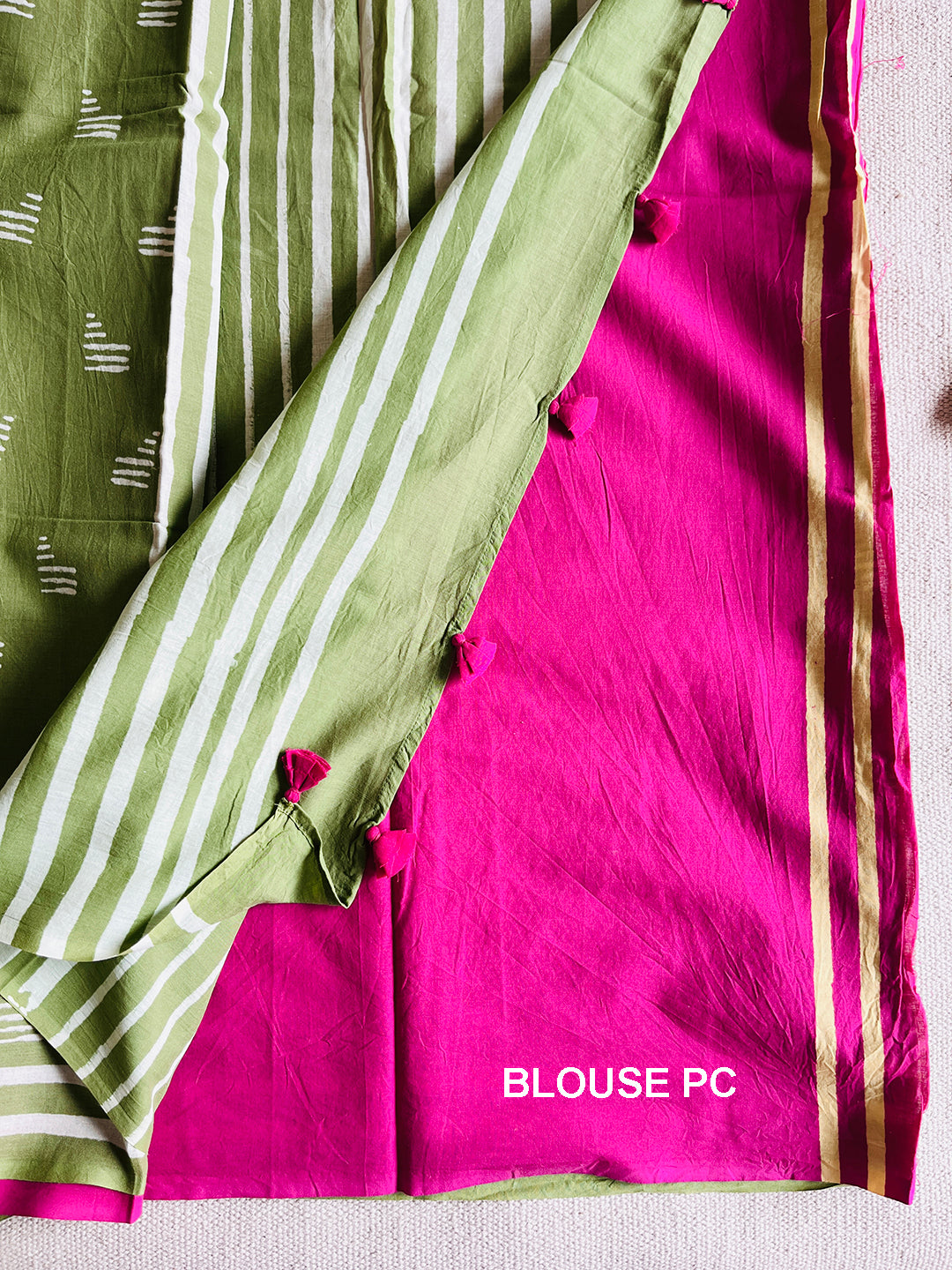 GREEN BLOCK PRINTED TASSELED MULMUL SAREE