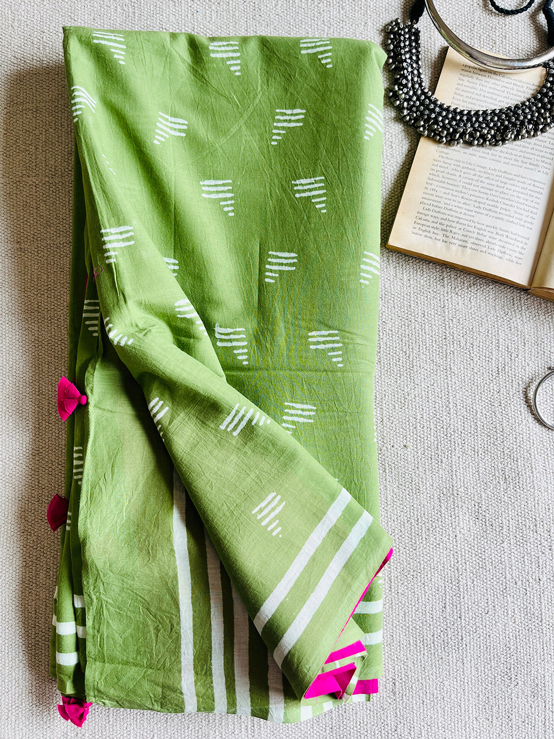 GREEN BLOCK PRINTED TASSELED MULMUL SAREE