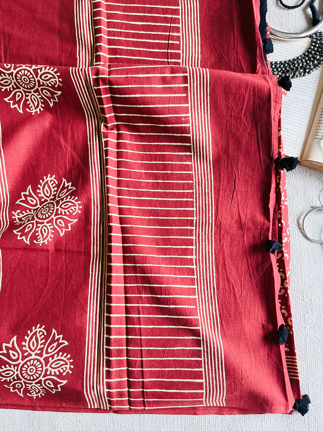 EARTHY-RED BLOCK PRINTED TASSELED MULMUL SAREE