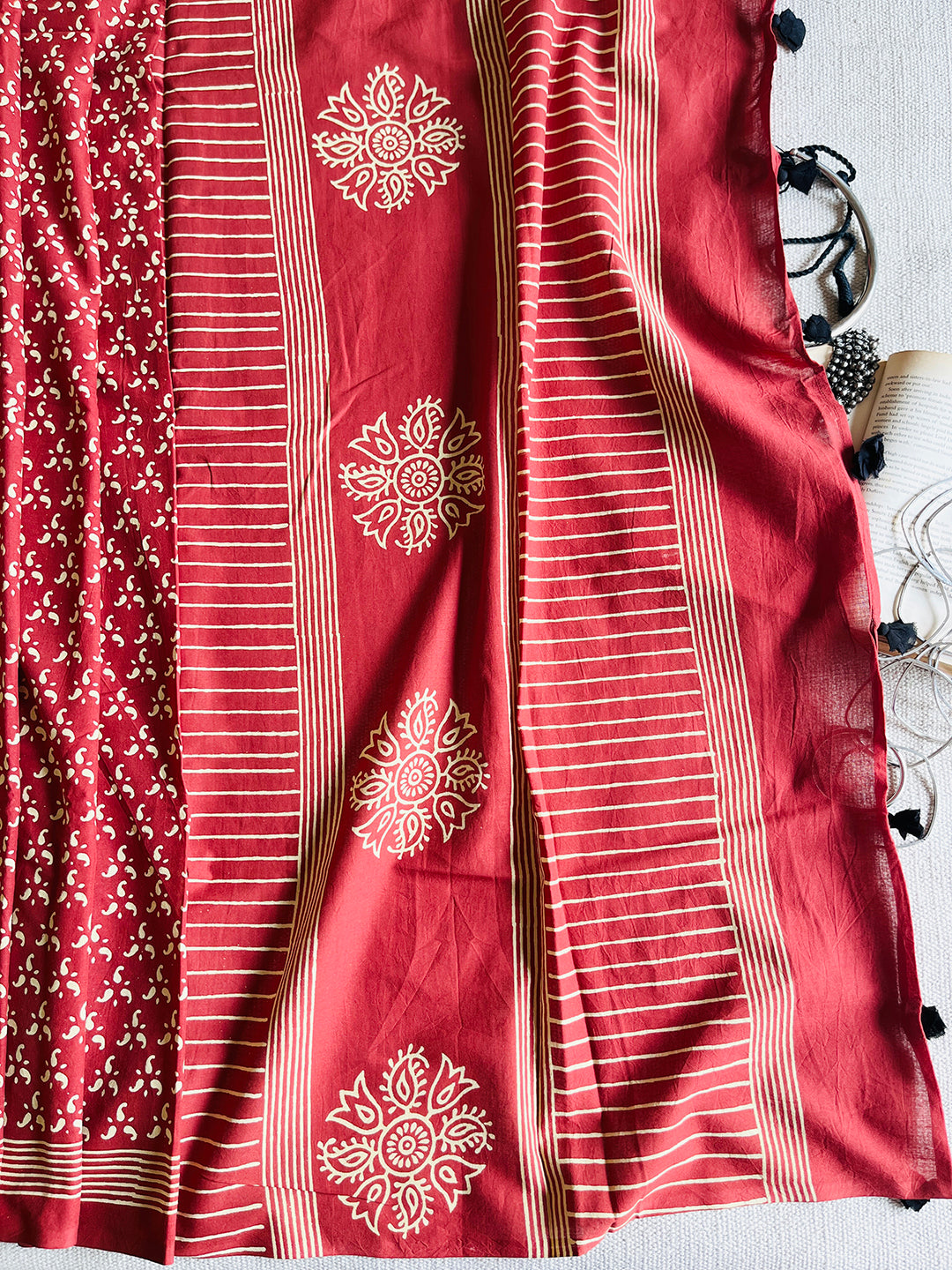 EARTHY-RED BLOCK PRINTED TASSELED MULMUL SAREE