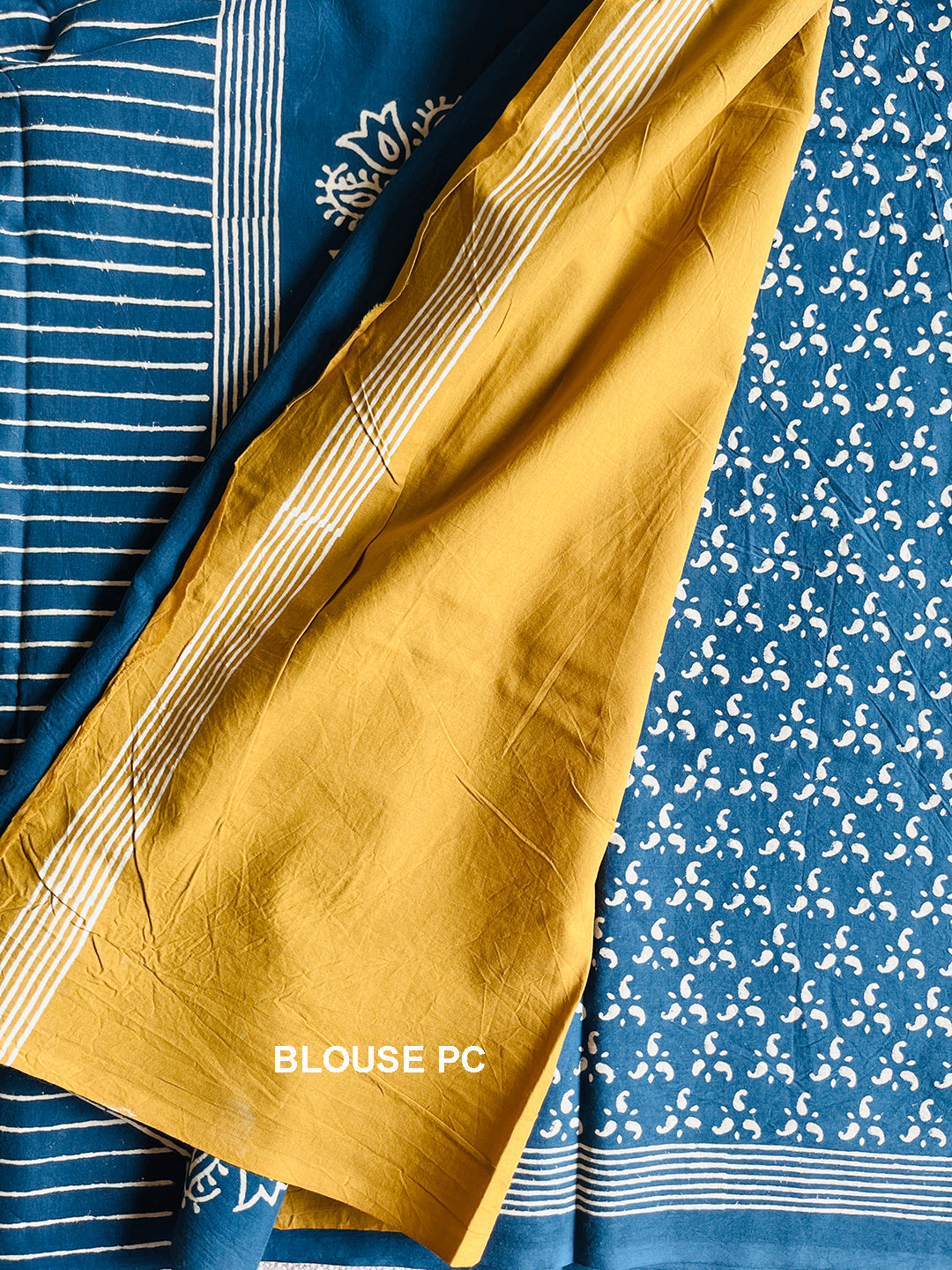 BLUE BLOCK PRINTED TASSELED MULMUL SAREE