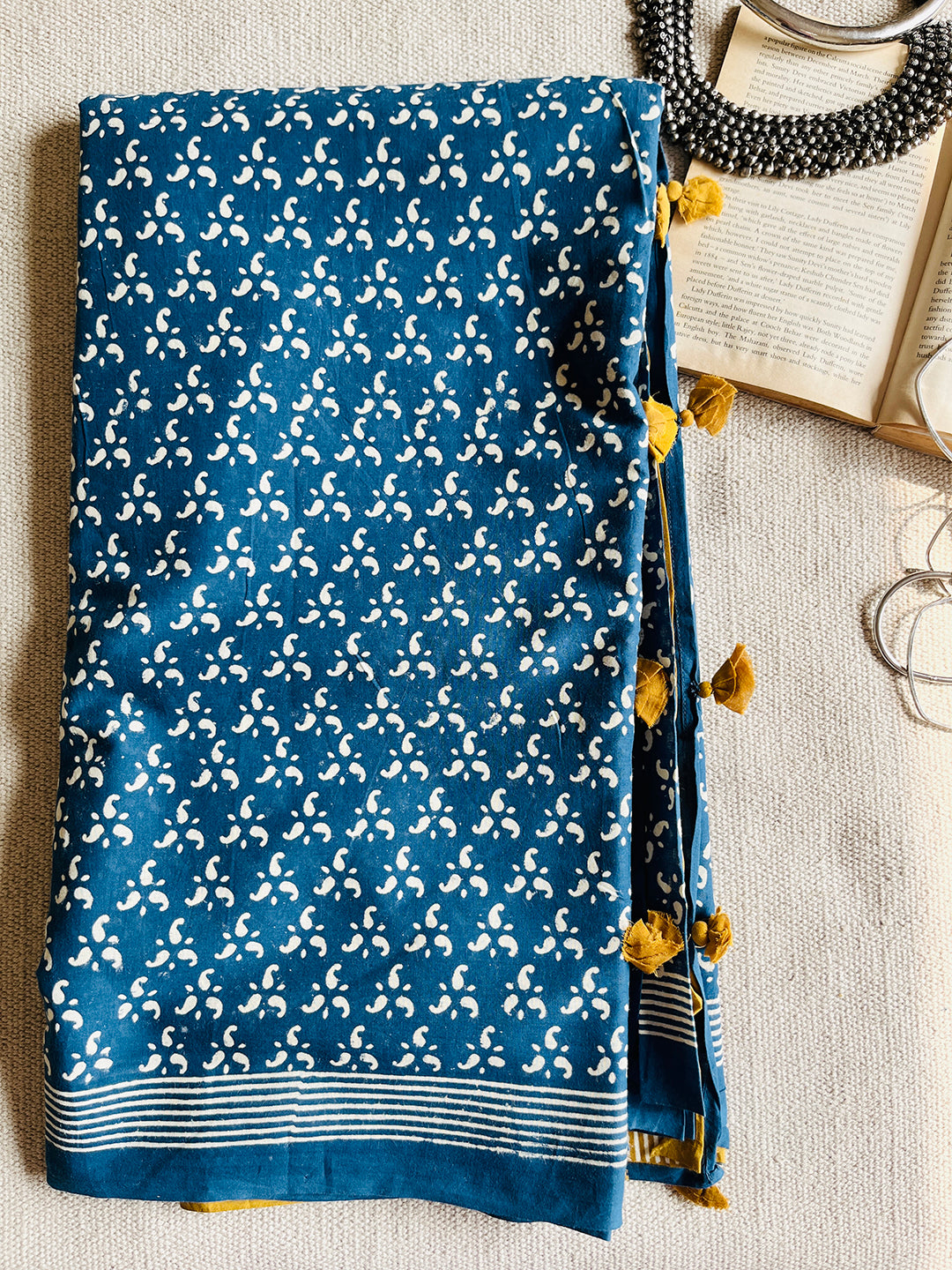 BLUE BLOCK PRINTED TASSELED MULMUL SAREE
