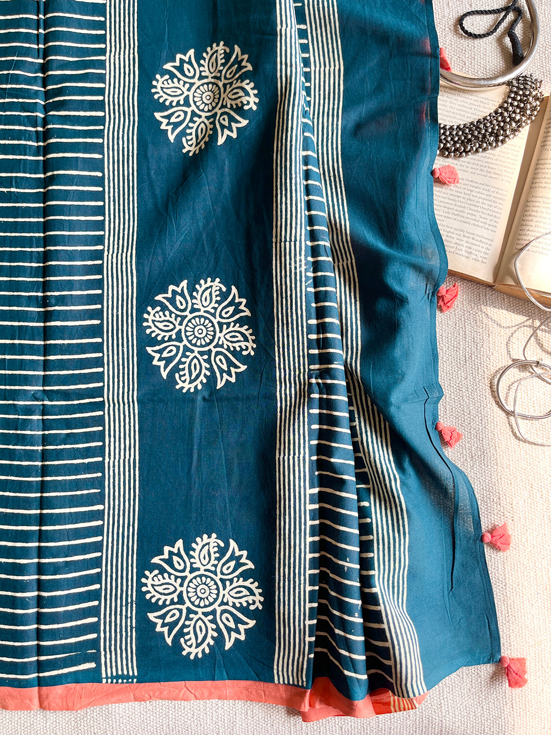 TEAL BLOCK PRINTED TASSELED MULMUL SAREE