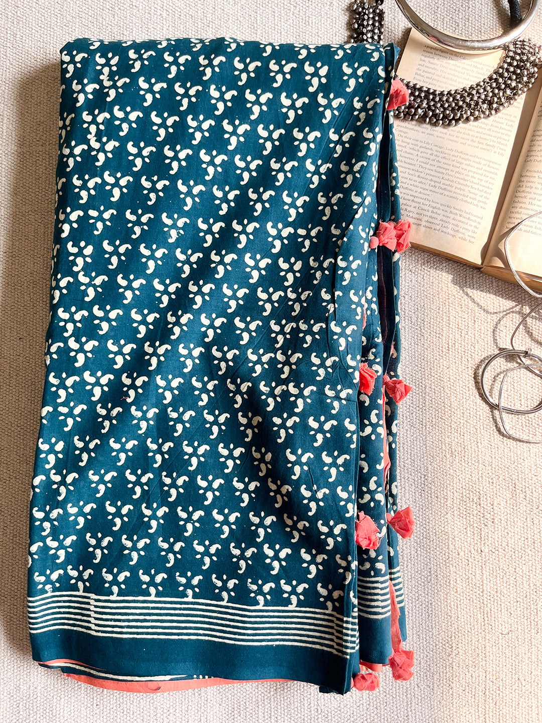 TEAL BLOCK PRINTED TASSELED MULMUL SAREE