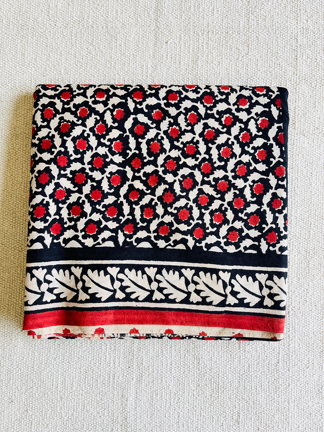 BLACK & RED ALLOVER PRINTED MULMUL SAREE