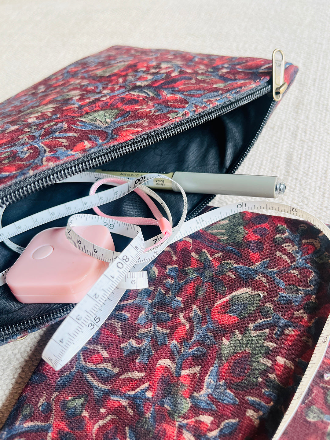 "CARRY YOUR ESSENTIALS" POUCH BLOCK PRINTED (SET OF 3)- MAROON