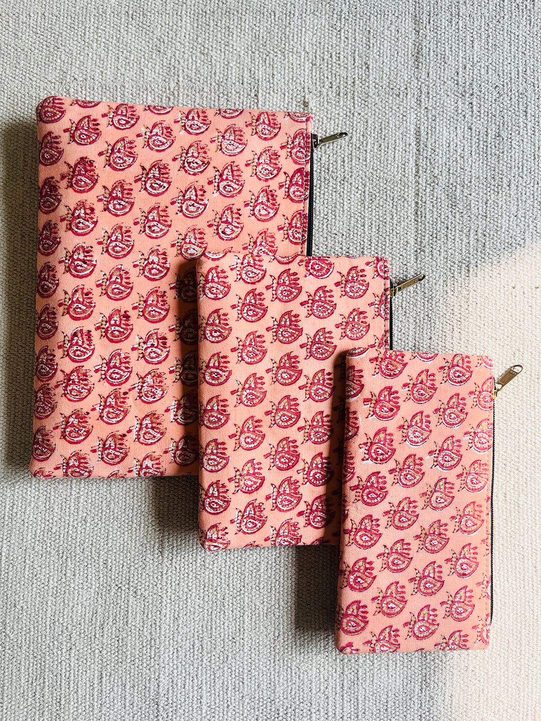 "CARRY YOUR ESSENTIALS" POUCH BLOCK PRINTED (SET OF 3)- PEACH