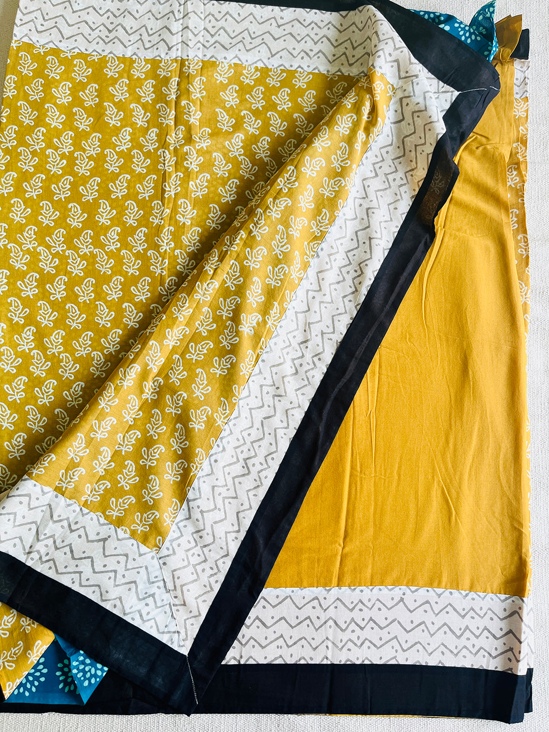 PRINT-MIX YELLOW MULMUL SAREE