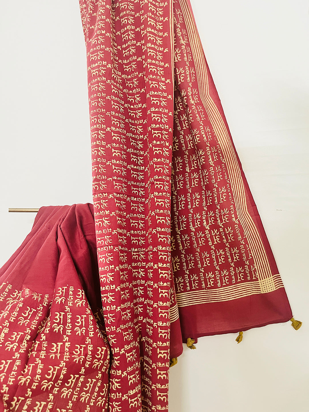 CALLIGRAPHY TASSELED MULMUL SAREE SCARLET RED