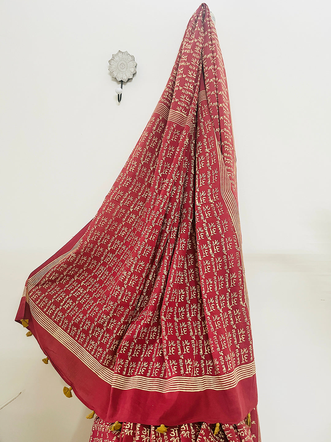 CALLIGRAPHY TASSELED MULMUL SAREE SCARLET RED