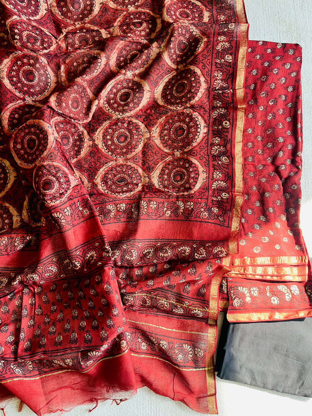 AJRAKH FLORAL BOOTIS CHANDERI UNSTITCHED SUIT- BRICK RED