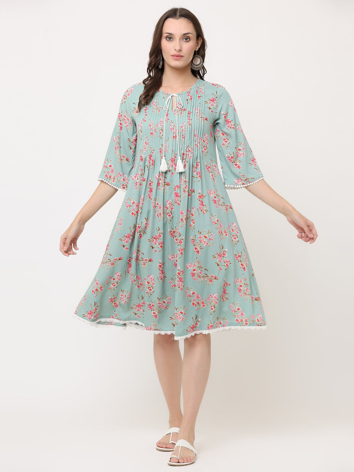 GREEN FLORAL PLEATED DRESS WITH TASSELS