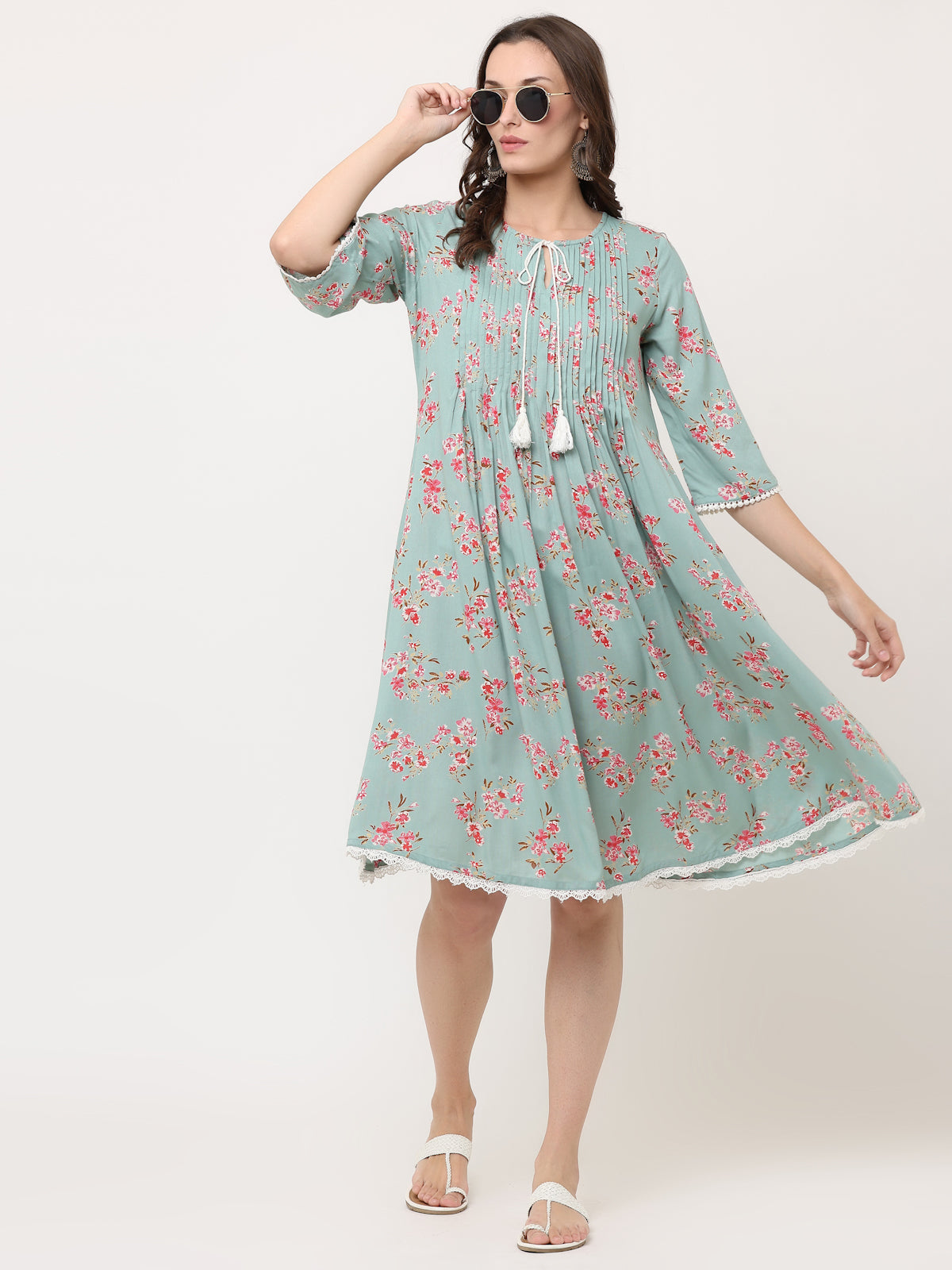 GREEN FLORAL PLEATED DRESS WITH TASSELS